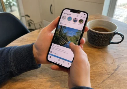 person checking how to turn off AI on Instagram on their phone